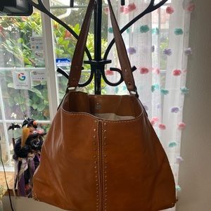 Michel kors large brown leather studded bag.